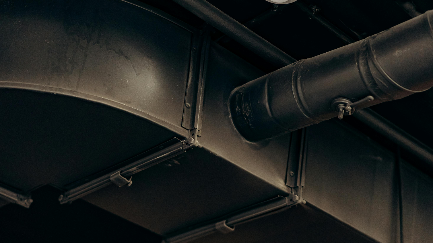 a moody image of air ducts inside of a house